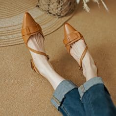 Elegant brown pointed toe shoes with ankle straps for women, perfect for stylish everyday wear and special occasions, offering comfort and sophistication.