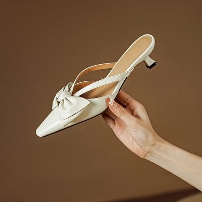 Luxurious women's high heel with bow decoration, perfect for fashion-forward looks and fine footwear collection. Shop at Monalisa Store for elegant, stylish women's shoes.