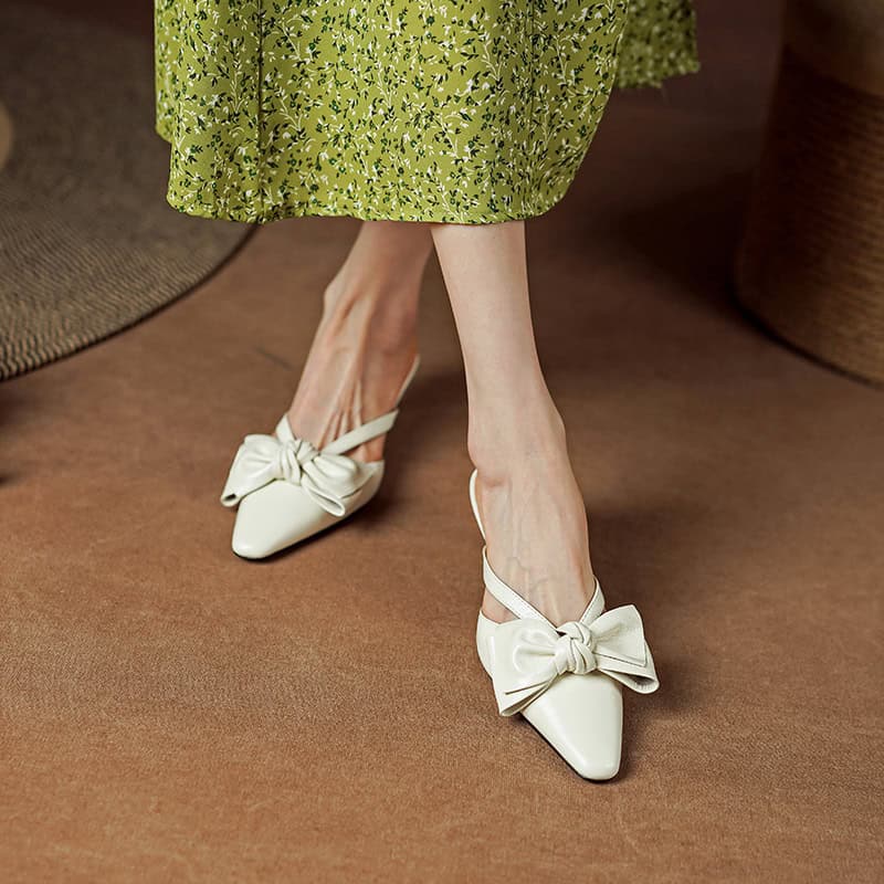Comfortable and stylish women's formal shoes featuring a bow accent, perfect for special occasions and professional settings. Made with high-quality materials for all-day wear.