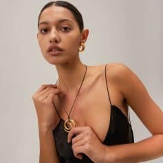 Stylish gold spiral earrings and matching necklace featured in Monalisa Store's trendy collection. Perfect accessories for enhancing your look with modern, luxurious appeal.