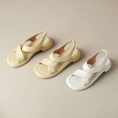 Comfortable women's sandals in neutral beige and white, featuring supportive straps and soft cushioning, ideal for everyday fashion, outdoor activities, and stylish summer outings.