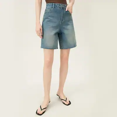 Stylish high-quality denim Bermuda shorts for women, perfect for casual and summer wear. Available in various washes, comfortable fit, and timeless design. Ideal for everyday outfits.