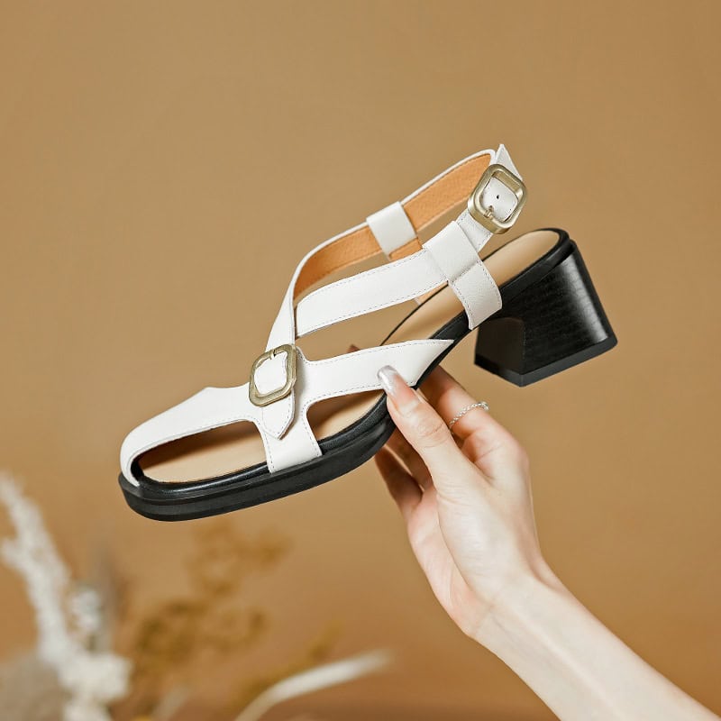 Stylish women’s white block heel sandals with adjustable ankle straps and metallic buckles, perfect for casual or dressy occasions. Comfortable and chic footwear from Monalisa Store.