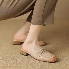 Stylish beige loafers with low heels and a chic design, displayed in a retail environment. Perfect for those looking for fashionable, comfortable footwear options available at Monalisa Medical Store.