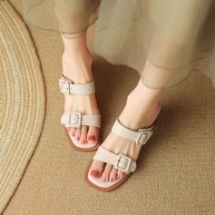 Stylish beige women's sandals with double buckle straps, ideal for casual or semi-formal occasions. Comfortable and trendy footwear from Monalisa Store.
