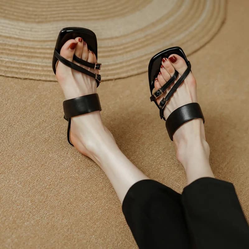 Black strappy women's sandals with ankle strap and open toe, perfect for summer and casual wear, available at Monalisa Store.