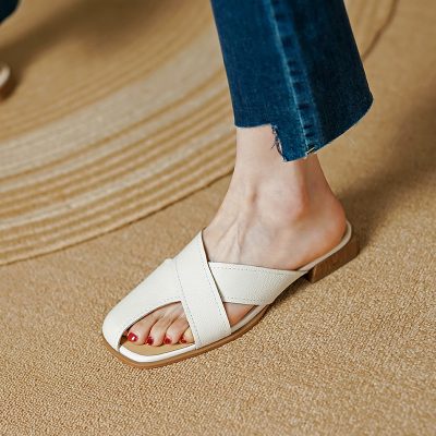 Elegant women's white sandal with a comfortable strap and casual style, perfect for daily wear and summer outfits.