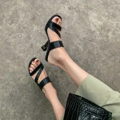 Elegant black strappy sandals for women, stylish and comfortable, perfect for various occasions. Showcase fashionable footwear available at Monalisa Store for enhanced style and confidence.