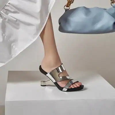 Chic metallic open-toe heels with chunky design, perfect for fashionable occasions. Elevate your style with trendy footwear from Monalisa Store.