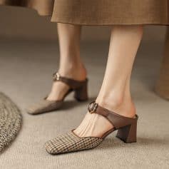 Elegant women's fashion shoes with block heels, stylish leather straps, and classic houndstooth pattern, perfect for sophisticated looks and comfort.