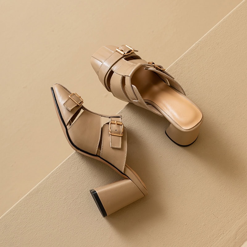 Elegant beige designer high heels with ankle straps and chunky heels for women.