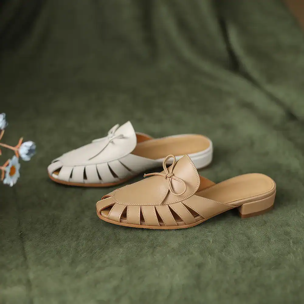 Comfortable women's open toe sandals with bow embellishment, ideal for everyday fashion, available at Monalisa Store.