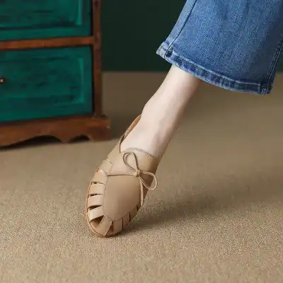 Handcrafted beige leather shoes with breathable design, perfect for comfortable daily wear and eye protection.