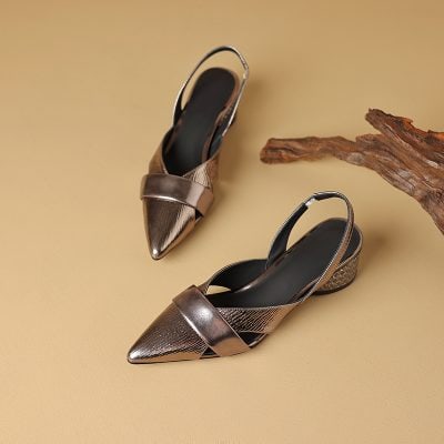 Stylish women’s metal heel shoes featuring pointed toes, strappy design, and metallic finish, perfect for fashion-forward occasions and accessory upgrade.