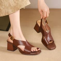High-quality brown leather sandals with chunky heels, perfect for women seeking fashionable and comfortable footwear for casual or formal occasions.