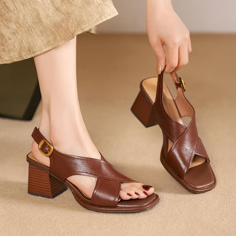 High-quality brown leather sandals with chunky heels, perfect for women seeking fashionable and comfortable footwear for casual or formal occasions.