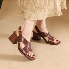 High-quality brown leather women's sandals with adjustable ankle strap and block heel, perfect for casual or formal occasions and enhancing your fashion statement.