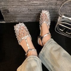 Elegant metallic mesh sandals with comfortable ankle straps, perfect for fashionable women.