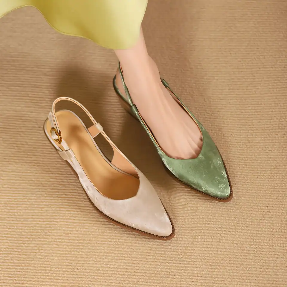 Stylish pointed-toe green and cream heels for women, perfect for fashion-forward looks and special occasions. Comfortable and chic footwear available at Monalisa Medical Store.