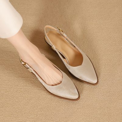 Stylish beige pointed-toe slingback shoes for women, ideal for office, formal events, and everyday wear. Featuring a comfortable fit and elegant design, these shoes enhance sophistication and style.