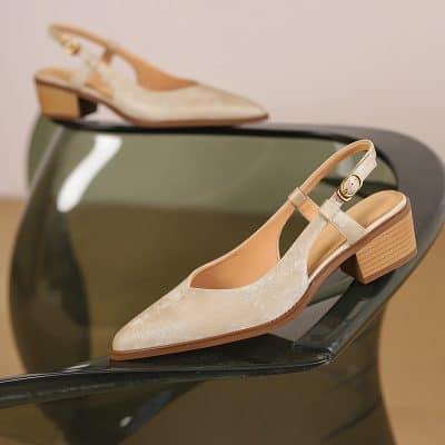 Luxury women's beige slingback heels with a block heel, perfect for formal occasions and stylish outfits. Made with high-quality materials for comfort and durability.