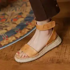 Comfortable leather espadrille sandal with ankle strap, perfect for women seeking stylish and supportive footwear options.