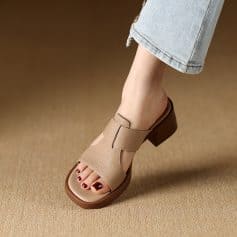 High-quality beige open-toe block heel sandal for women, featuring comfortable wide strap and chunky heel, perfect for fashion-forward look and daily wear.