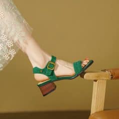 Elegant green women's sandal with buckle detail, perfect for fashionable summer wear, from Monalisa Medical Store.