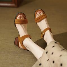 Stylish brown suede open-toe sandals with ankle strap and adjustable buckle, perfect for summer and casual wear.