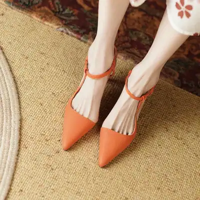 Stylish orange pointed toe shoes with ankle straps, perfect for women's fashion, comfortable, and high-quality. Ideal for formal or casual occasions, enhancing your wardrobe with trendy footwear.