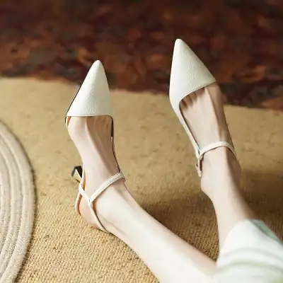 Stylish women's heels with pointed toes and ankle straps, perfect for formal occasions and everyday wear. Made with high-quality materials for comfort and durability.