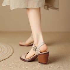 High-quality women's designer sandals with block heels and adjustable ankle straps, perfect for fashion-forward looks and comfort. Ideal for casual outings and stylish ensembles.