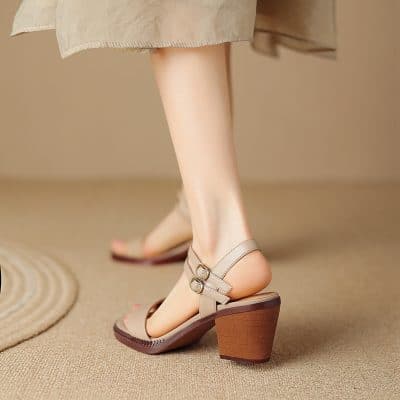 High-quality women's designer sandals with block heels and adjustable ankle straps, perfect for fashion-forward looks and comfort. Ideal for casual outings and stylish ensembles.