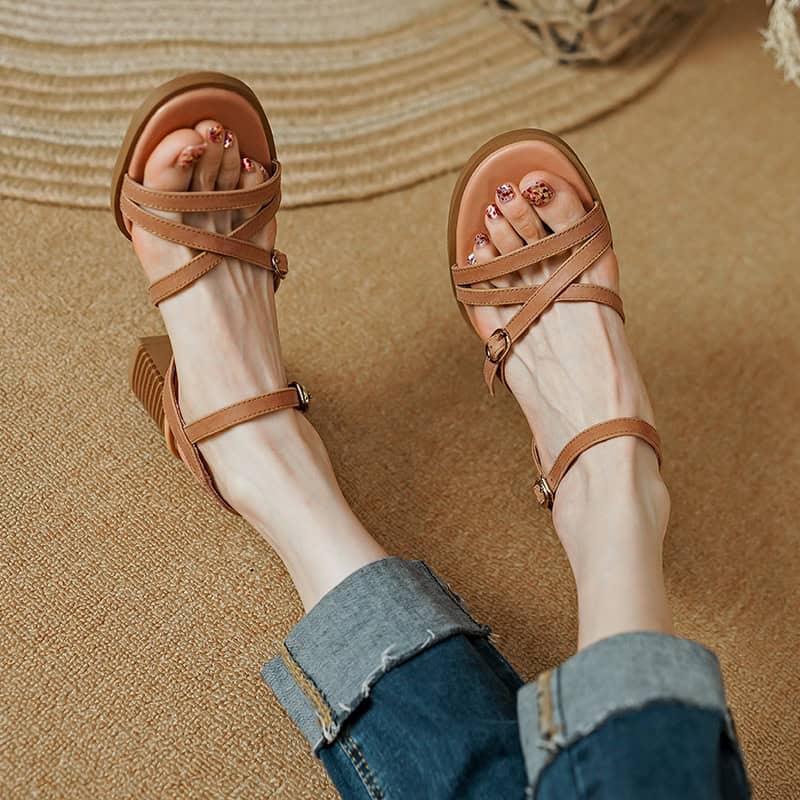 Strappy beige open-toe sandals with block heels, perfect for summer outings. Comfortable and fashionable footwear option available at Monalisa Store for women.