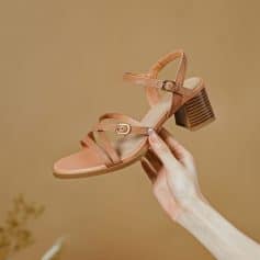 Versatile women's sandal with ankle strap, block heel, and open toe, perfect for casual or dressy occasions. Comfortable and trendy, suitable for summer wear.
