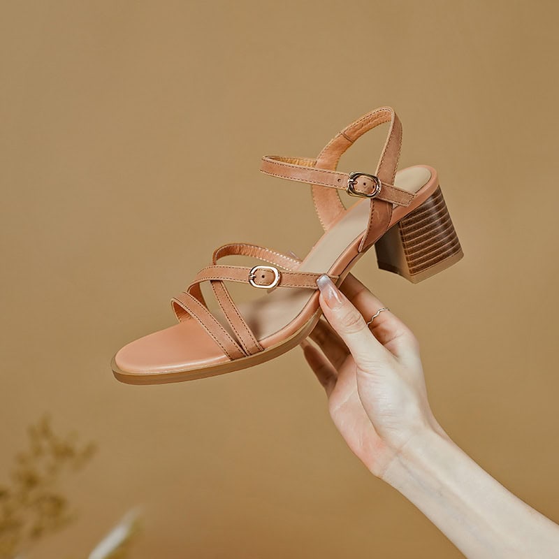 Versatile women's sandal with ankle strap, block heel, and open toe, perfect for casual or dressy occasions. Comfortable and trendy, suitable for summer wear.