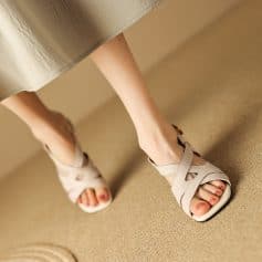 Comfortable women's open-toe beige sandals, trendy summer footwear with ankle straps, ideal for stylish and comfortable dressing.
