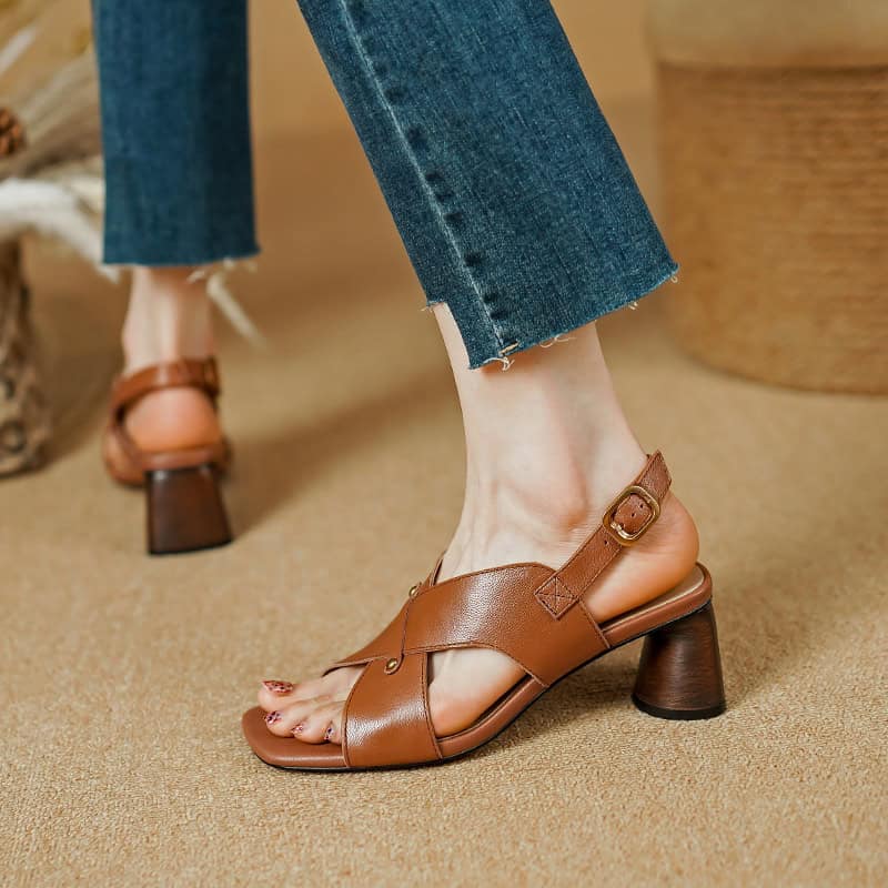 Elegant brown high-heeled sandals with ankle straps, perfect for stylish occasions and fashion-forward footwear enthusiasts.