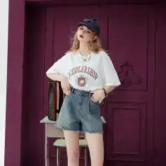 Stylish young woman wearing casual fashion with trendy jewelry and a hat at Monalisa Medical Store, showcasing fashionable eyewear options.