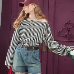 Elegant striped casual top with off-shoulder design, perfect for trendy and comfortable fashion. Ideal for everyday wear and stylish outings.