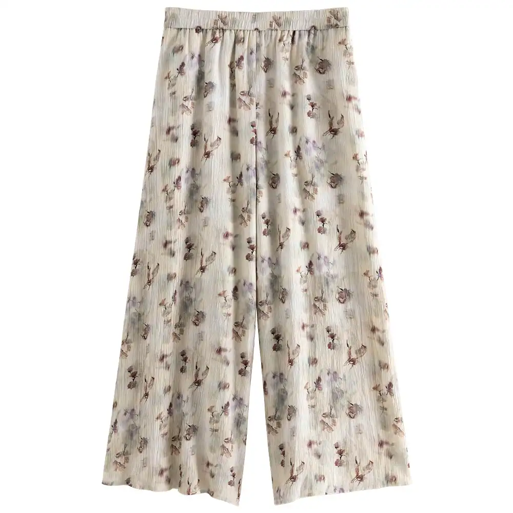 Elegant floral wide-leg trousers for women, perfect for casual or dressy occasions, made from lightweight, comfortable fabric.
