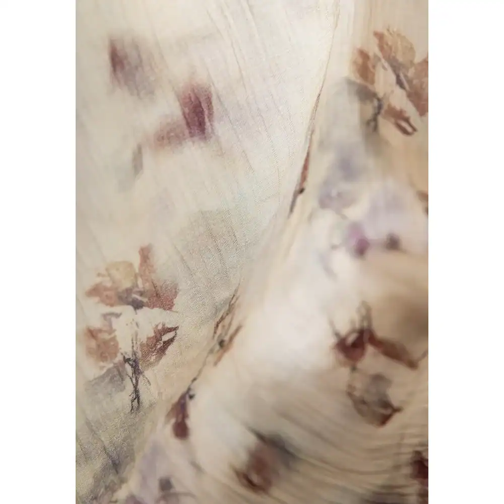 Close-up of floral-patterned eyeglass frame showcasing intricate design and craftsmanship for stylish eye wear.