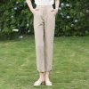 Women’s beige tailored pants for a sophisticated look, comfortable fit, and versatile style, suitable for work or casual outings.
