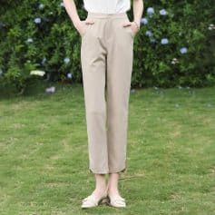 Women’s beige tailored pants for a sophisticated look, comfortable fit, and versatile style, suitable for work or casual outings.