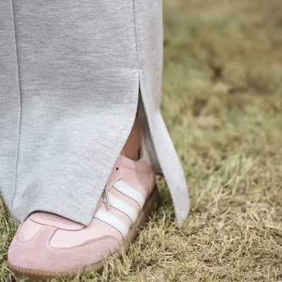 High-quality pink sneakers with white stripes, perfect for enhancing your look and comfort at Monalisa Store. Designed for modern fashion enthusiasts seeking stylish footwear options.