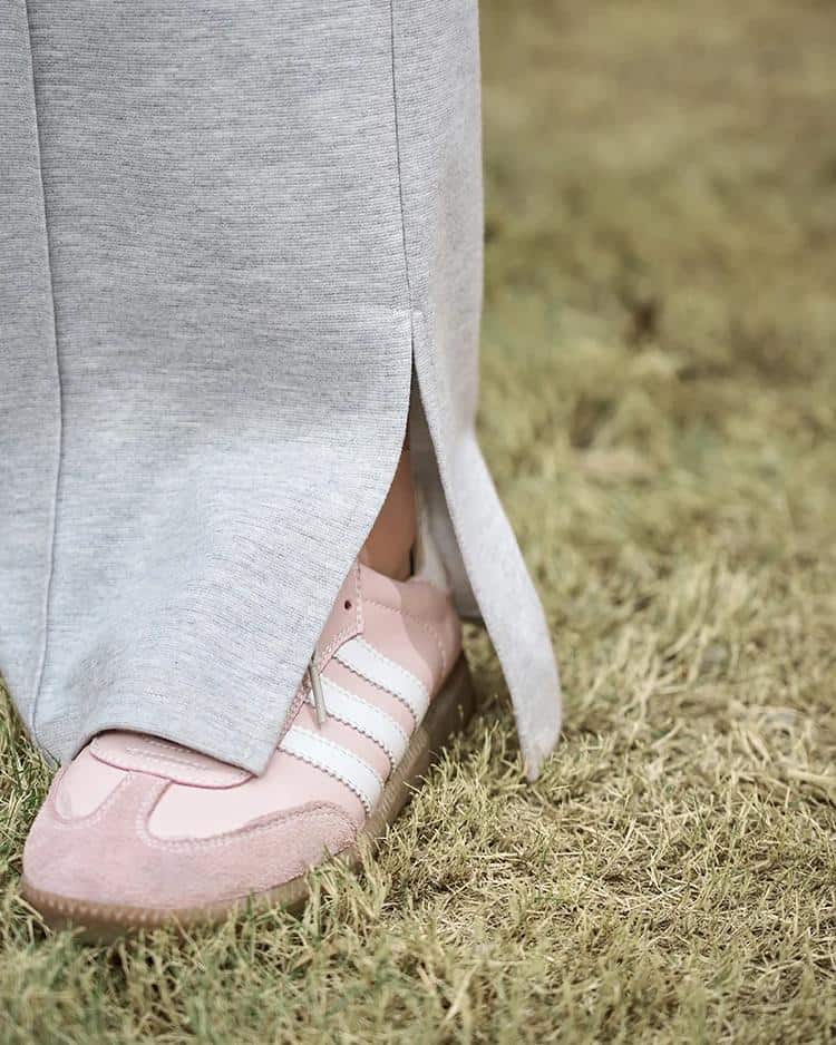 High-quality pink sneakers with white stripes, perfect for enhancing your look and comfort at Monalisa Store. Designed for modern fashion enthusiasts seeking stylish footwear options.