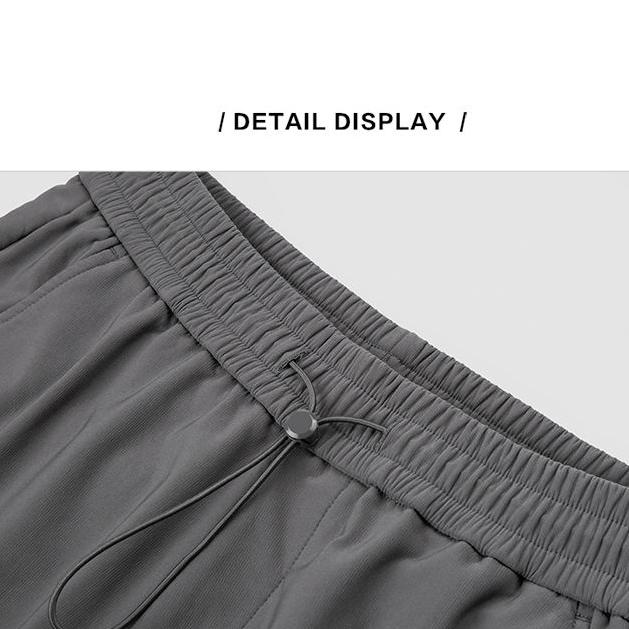 Comfortable men's casual shorts with adjustable waistband for everyday wear and outdoor activities. Featuring durable fabric and a modern design for versatile styling.
