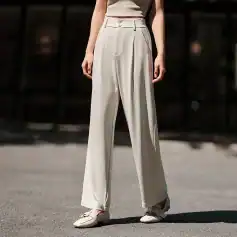 Elegant wide-leg trousers perfect for professional or casual wear, featuring a high waist and comfortable fit, ideal for modern fashion enthusiasts.