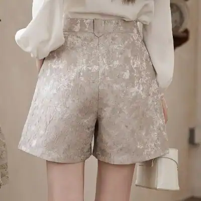 Stylish beige lace shorts for women, perfect for summer and casual wear, offering comfort and chic fashion inspiration.