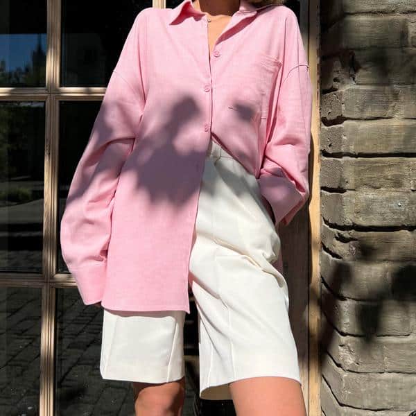 Optical view of a fashionable pink women's shirt paired with white shorts, perfect for modern, casual, and elegant looks. Ideal for shopping at Monalisa Medical Store.